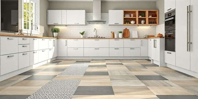 Modern kitchen with white cabinets, wood countertops, stainless steel appliances, and patterned tile flooring. Potted plants and kitchen items are on the counters and open shelves.