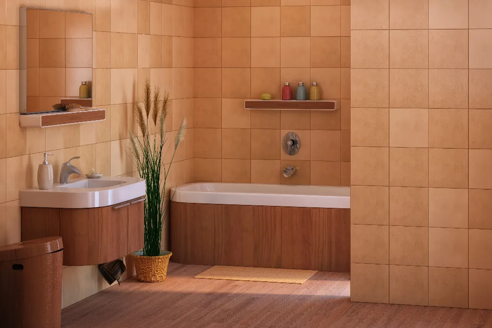 Modern bathroom with tan tiled walls, wood accents, a wall-mounted sink, a bathtub, a mirror, a potted plant, a trash bin, and bathing products on a shelf above the tub.