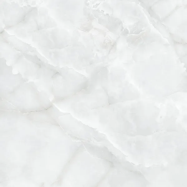 White marble surface with light gray veining and a smooth, polished texture.